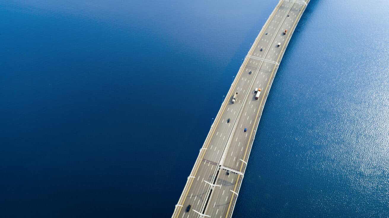 aerial-view-of-a-high-way-over-blue-water