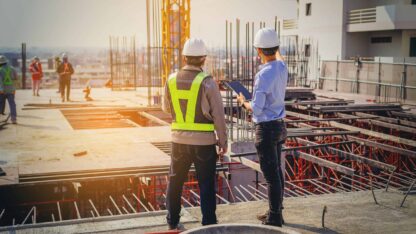 Contractors discussing project status on a worksite