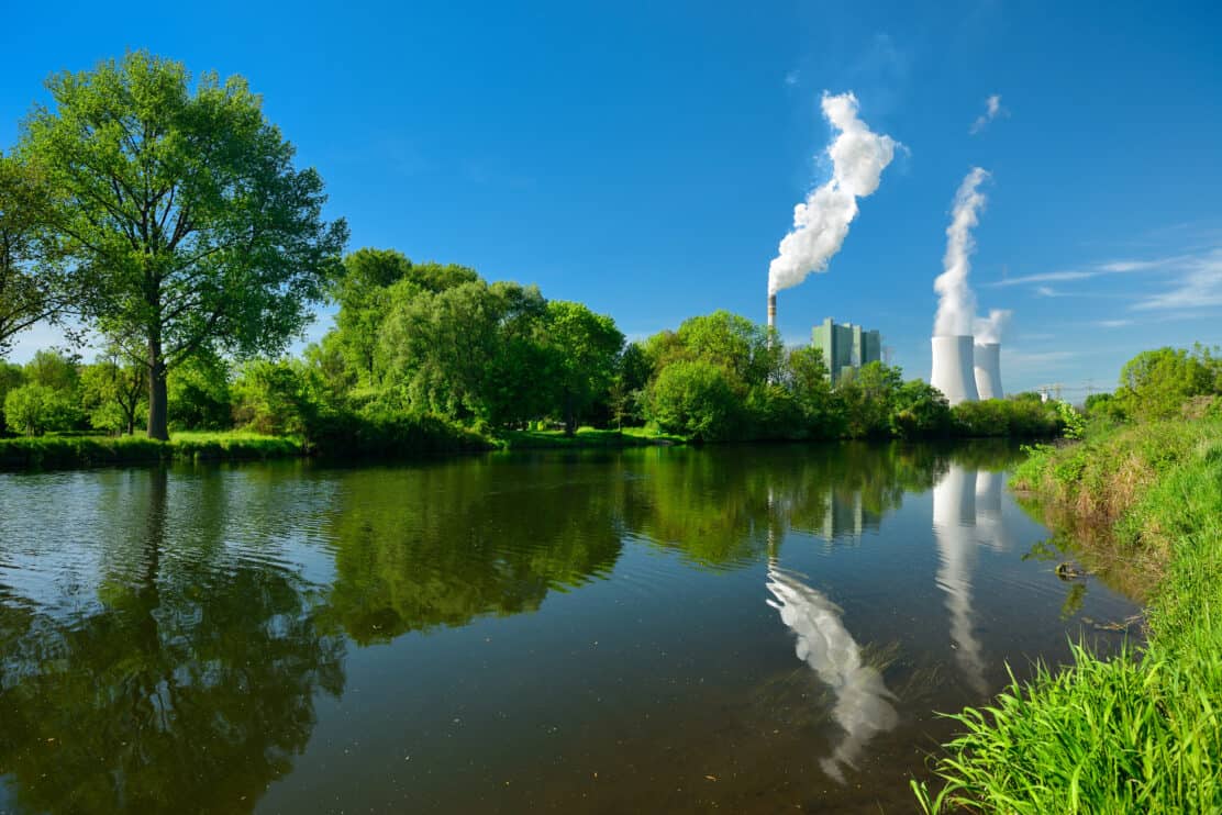 smoking-coal-power-plant-reflecting-in-river