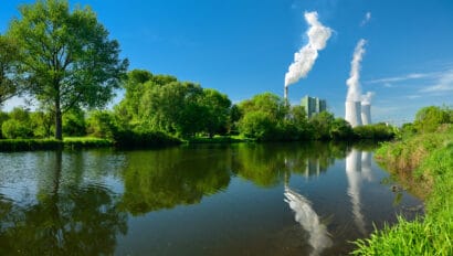 smoking-coal-power-plant-reflecting-in-river