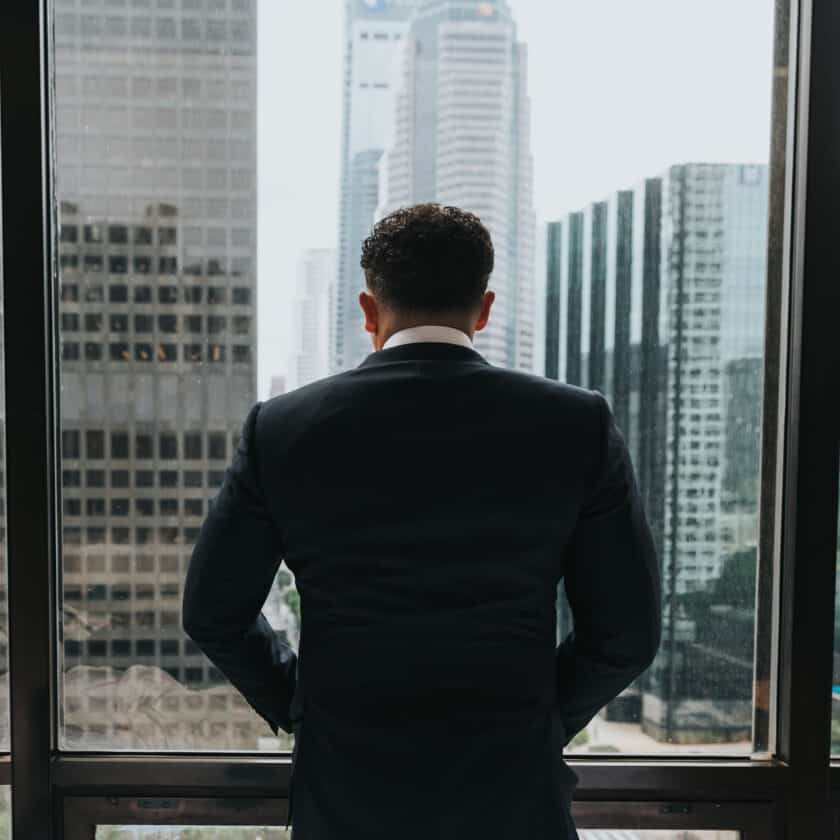 Back of a man in a suit.