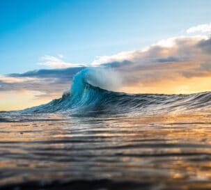 Ocean waves during a sunrise.