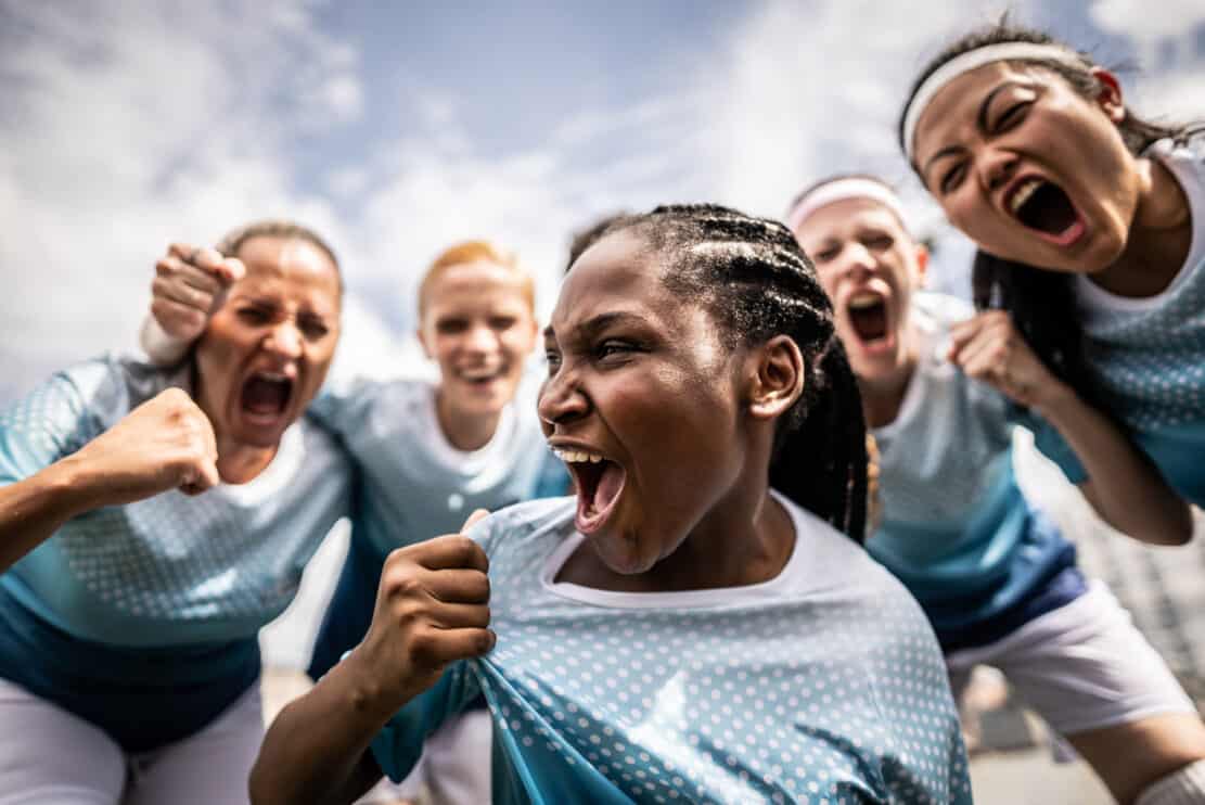 portrait-of-a-female-soccer-team-celebrating