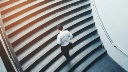 Man walking up stairs.