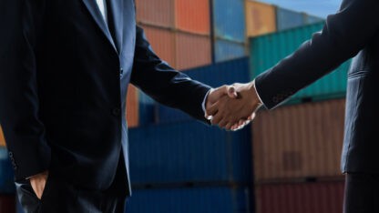 image of men shaking hands