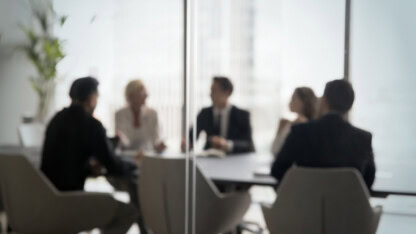 Meeting in a law firm conference room to discuss trust accounting