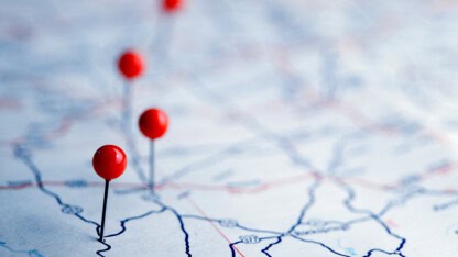 Map with pins representing different business locations across state lines