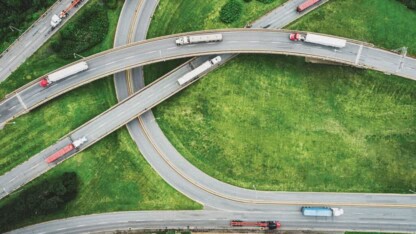 Vehicles navigating an intricate roadway system representing partnerships dealing with Section 751 exchanges