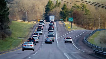 Vehicle exiting the highway representing a business preparing for a successful exit