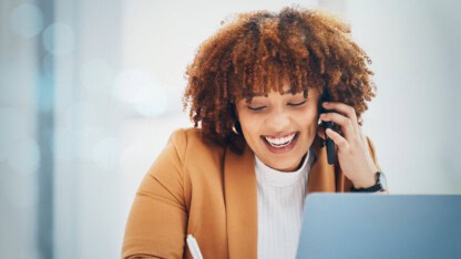 Business manager on the phone with client in office