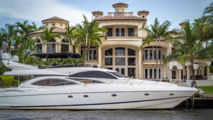 Image of a boat in an exotic setting representing the assets and planning needs of high-net worth individuals like entertainers and professional athletes