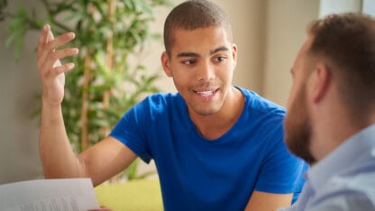 Student athlete discussing name, image, likeness (NIL) and revenue sharing options with representative