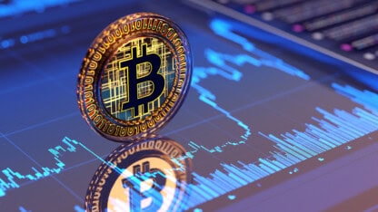 Image of a bitcoin, representing the tax changes of digital assets