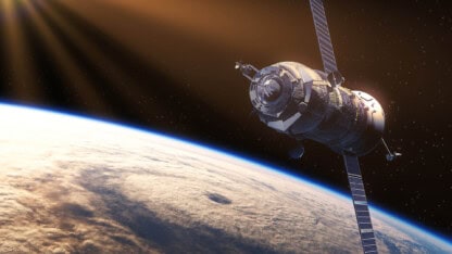 Satellite orbiting over a storm in the planet's atmosphere.