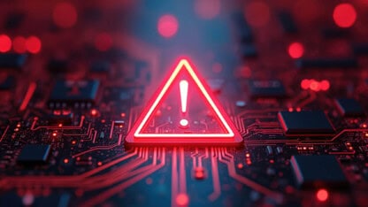 Red alert signal over circuits representing cyber and fraud risks to Tribal grant programs