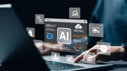 Person using a laptop with an AI dashboard and floating technology icons.
